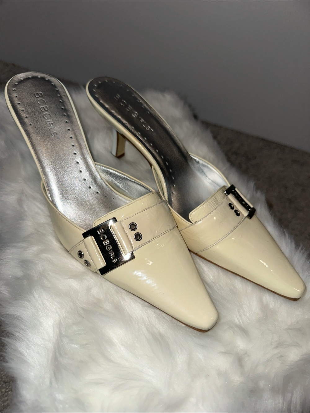 BCBGeneration Cream Patent Pointed Mule Heels with Silver Buckle